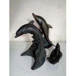 A contemporary bronze figure, dolphins,