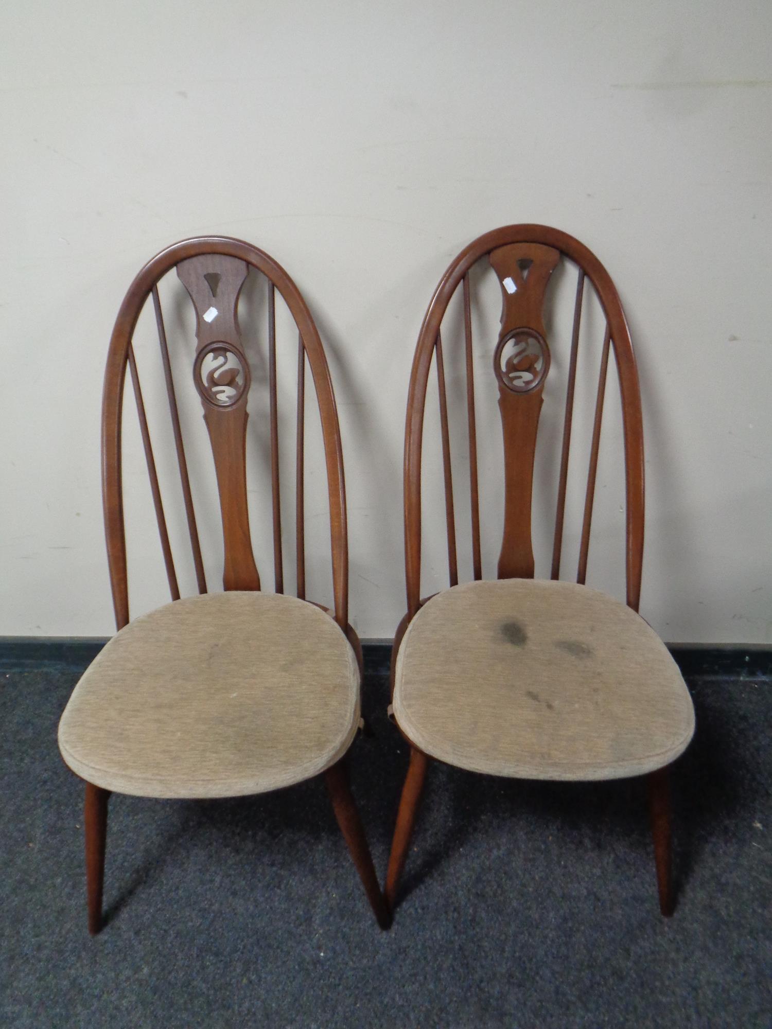 An oval Ercol pedestal extending dining table fitted a leaf together with a set of six Windsor swan - Image 2 of 3