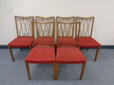 A set of six 20th century continental beech spindle back dining chairs