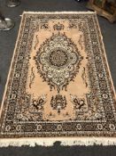 A fringed Persian design rug,