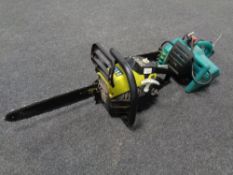 A power XT petrol chain saw together with a Bosch electric chain saw