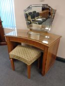 A 1930's walnut Art Deco dressing table with stool