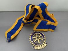 A Rotary International Vice President medallion on ribbon