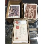 Three boxes containing a collection of antiquarian and later postcards