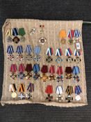 Approximately thirty four reproduction medals and badges of Russian/ Eastern European interest (34)