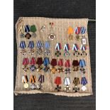 Approximately thirty four reproduction medals and badges of Russian/ Eastern European interest (34)