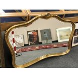 A reproduction bevelled overmantel mirror,