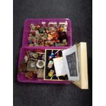 Two plastic storage boxes with lids containing assorted ornaments to include Winnie The Pooh