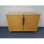 A mid 20th century Danish System B8 shutter door office stationary cabinet (no shelves)