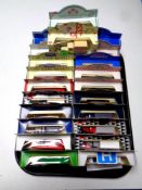 A tray containing 22 assorted die cast vehicles to include Tetley, Vanguards, Kleenex etc,