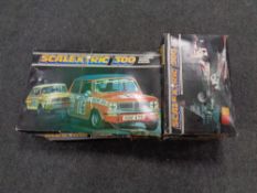 A boxed Scalextric 300 electric model racing set complete with cars,