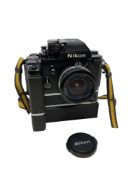 A Nikon F2 camera fitted with Nikkor 20mm 1:4 lens 136545, with Nikon motor drive MD-2 and MB-1.