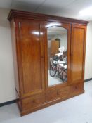 A Victorian mahogany triple door wardrobe
