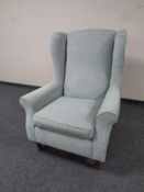 A Marks and Spencer's wingback armchair, 100 cm high x 77 cm wide x approx. 85 cm deep.