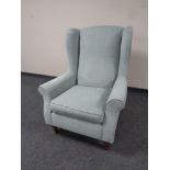 A Marks and Spencer's wingback armchair, 100 cm high x 77 cm wide x approx. 85 cm deep.