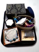 A tray containing jewellery boxes containing assorted costume jewellery, plated cigarette case,