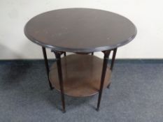 An Edwardian stained beech two tier circular occasional table,