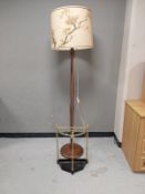 A beech standard lamp together with a brass stick stand