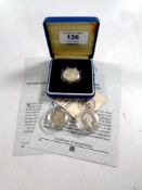 Three Royal Mint silver proof one pound coins, 1983 (cased) together with 1983 and 1986,