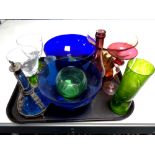 A tray containing 20th century and later coloured glassware to include two tone goblets,