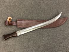 A fine double-edged knife/sword with ornate Damascus blade, wooden handle, overall length 61 cm,
