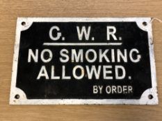 A metal railway plaque - "G.W.R. NO SMOKING ALLOWED BY ORDER", 19 cm X 30 cm.