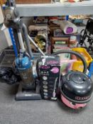 A Hetty vacuum cleaner together with a Vortex vacuum cleaner and a boxed steam mop