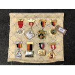 Eight reproduction medals and badges of German interest (8)
