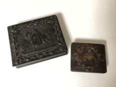 An ornate cast resin daguerreotype case together with one further similar box