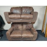A pair of brown suede leather two seater settees