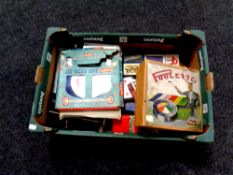 A box containing Poolette game, playing cards, vintage Mettoy metal pistol targets,