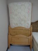 A pine 3ft bed frame with mattress