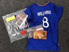 A Robbie Williams 'Sing When You're Winning' jersey together with a small quantity of ticket stubs