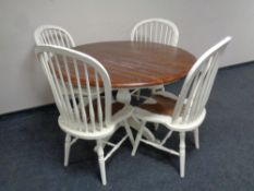 A Laura Ashley French style shabby chic circular pedestal dining table together with four spindle