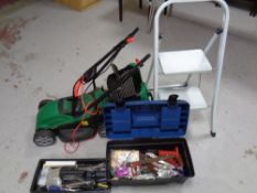 A Qualcast electric lawn mower together with a folding metal step and a toolbox with contents