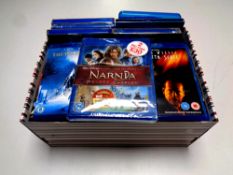 A box containing a quantity of blu-ray discs