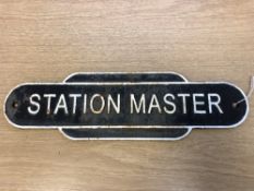 A metal railway plaque - "STATION MASTER", 11 cm x 39 cm.