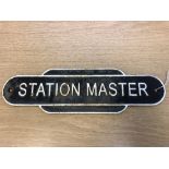 A metal railway plaque - "STATION MASTER", 11 cm x 39 cm.