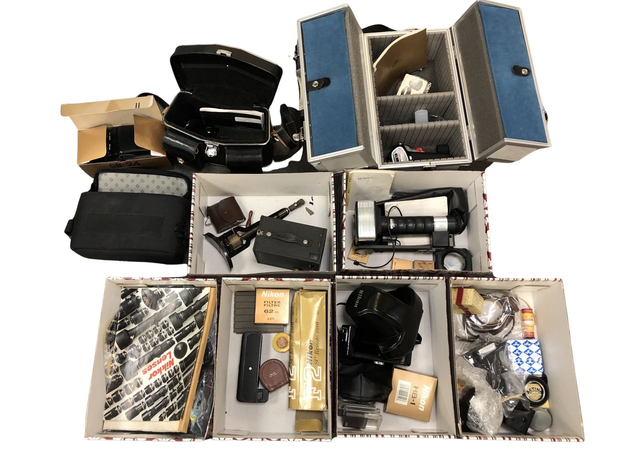 Several aluminium camera cases and bags containing photography accessories, flashes,