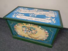 A painted blanket chest with Jethro Burdock and Sons advertising decoration to top,