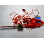 A Flymo electric hedge trimmer (as new)