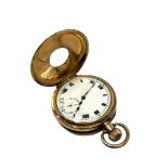 A gold plated half hunter pocket watch in Dennison case CONDITION REPORT: In going