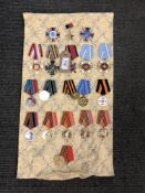 Approximately nineteen reproduction medals and badges of Russian/ Eastern European interest (19)