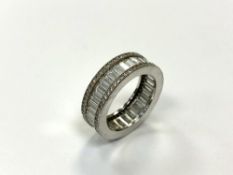 A silver full eternity ring, size O.
