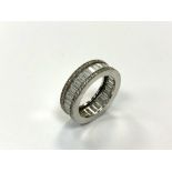 A silver full eternity ring, size O.