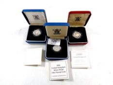 Three Royal Mint silver proof one pound coins, 1994, 1995 and 1996,