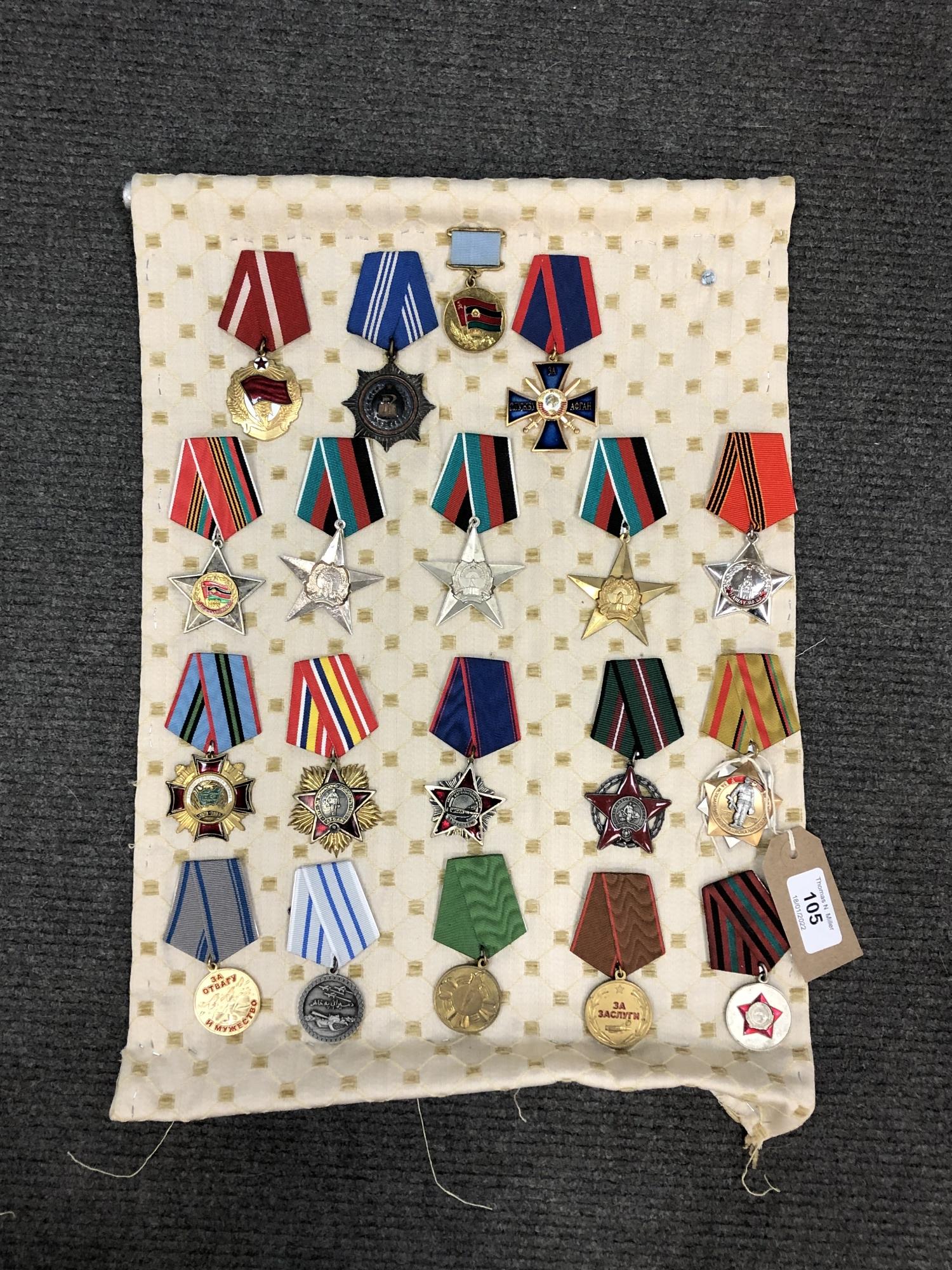 Approximately nineteen reproduction medals and badges of Russian/ Eastern European interest (19)