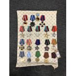 Approximately nineteen reproduction medals and badges of Russian/ Eastern European interest (19)