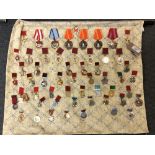 Approximately fifty-eight reproduction medals and badges of Russian/ Eastern European interest (58)