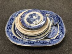 A 19th century blue and white meat plate together with other blue and white porcelain plates,